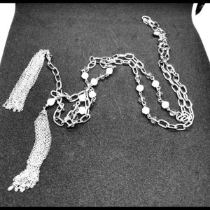 Silver tone necklace.